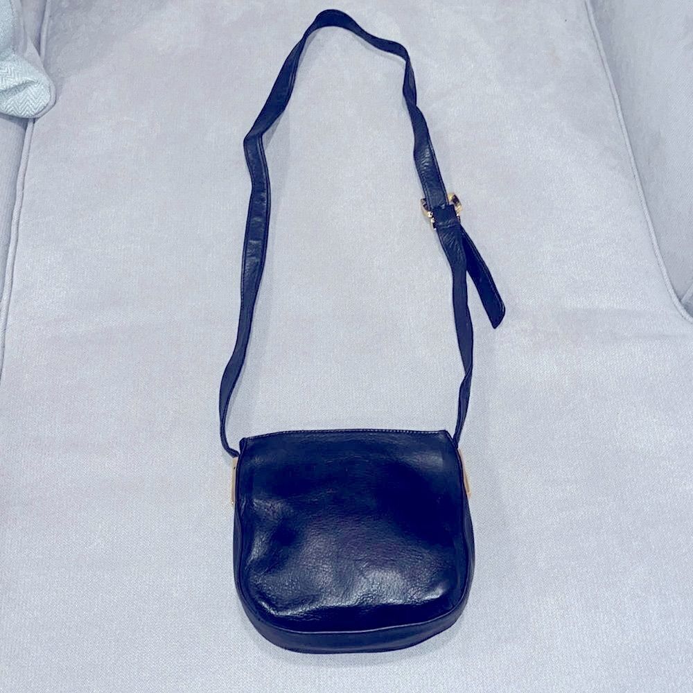 Vintage Perlina New York black leather crossbody 7.5”x 7”x21” adjustable strap.